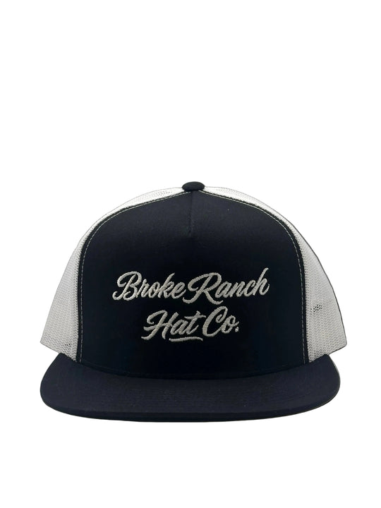 Black and white cap with 'Broke Ranch Hat Co.' text on a light gray background